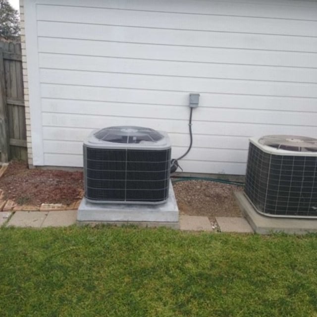 Air conditioner condensers outside of home