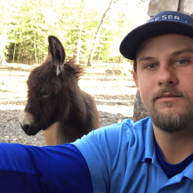 Aire Serv Pro with a donkey