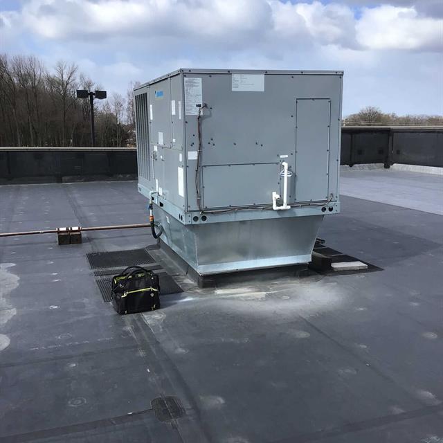 Commercial AC unit installed on a rooftop