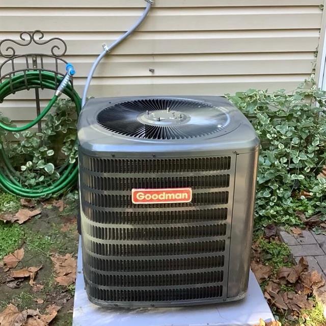 Goodman AC unit installed outside a home