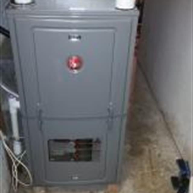 New high efficiency Rheem gas furnace installation.