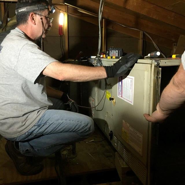 Old furnace being removed.