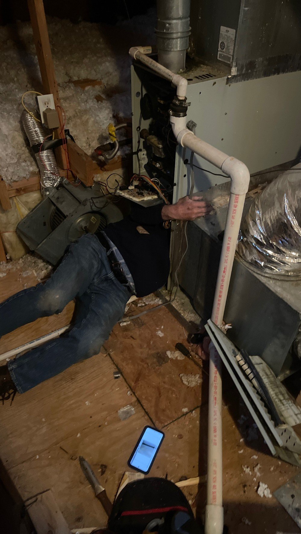 Service expert works for homeowner to get her heat back on.