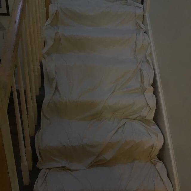 Staircase covered with tarp