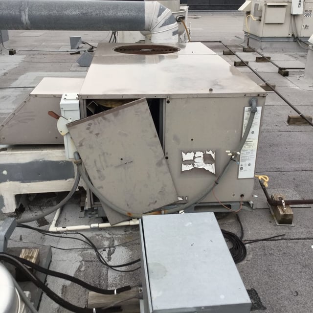 broken unit on roof