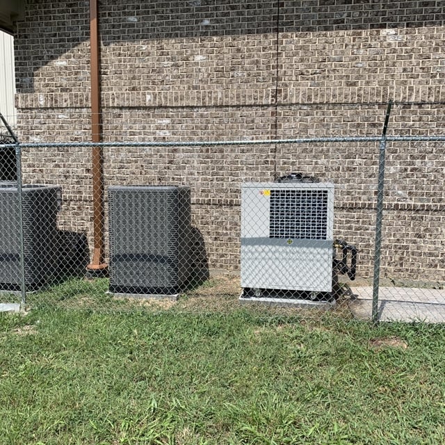 grass and ac unit