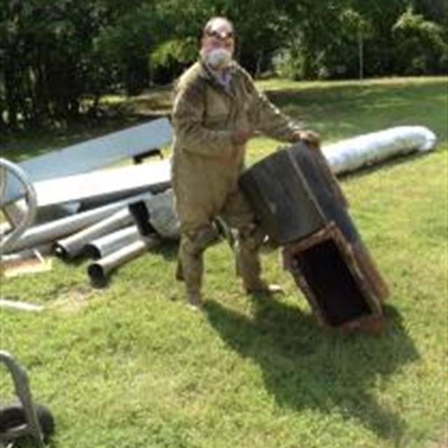 man working on hvac unit