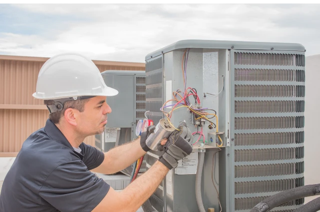 technician maintenance on furnace