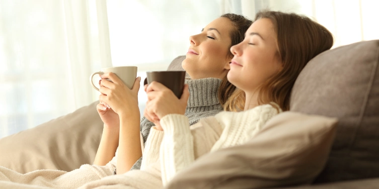 Women relaxing on a couch