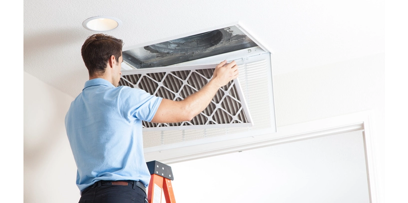 HVAC professional cleaning air return | Aire Serv of Jackson