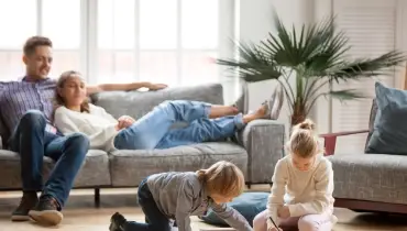 A family in the living room.