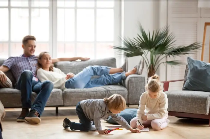 A family in the living room.