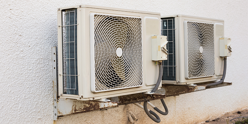 Two heat pumps mounted outside