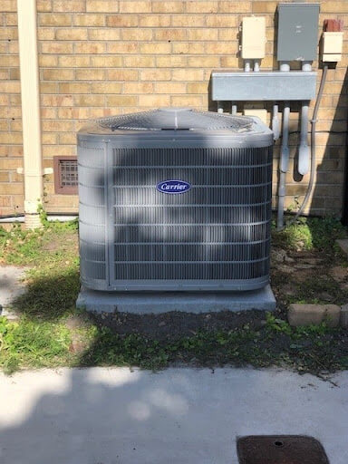 Carrier Cooling System Installed Outside The Home