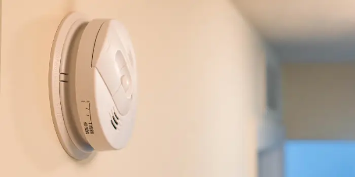 Smoke detector mounted on wall