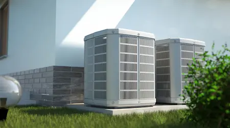 Pair of white outdoor HVAC units.