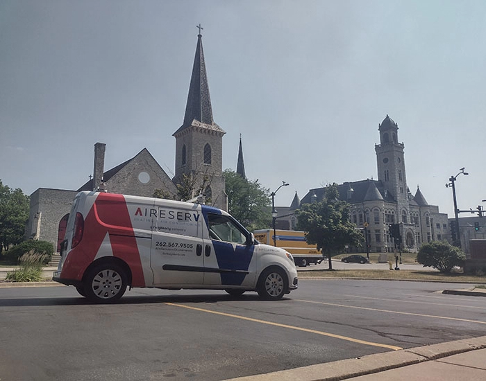 Aire Serv branded van in Waukesha, WI.