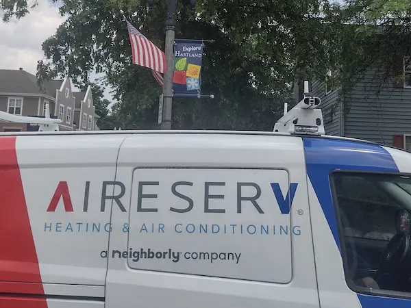 Close-up of Aire Serv branded van.